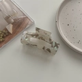 Detail view of large marble acetate hair claw clip with pearlescent shell texture - Large Square Claw / Phantom Grey