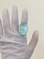 Macro view of a large oval green resin ring with pearlescent fiber texture and cat-eye effect - 18-18.5mm / Pearlescent Light Green