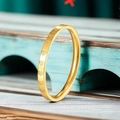 Minimalist gold stainless steel ring with laser-cut heart patterns on a slim band - XS / Heart Engraved Style / Gold