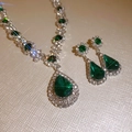 Detailed close-up of emerald green teardrop necklace and earrings with silver pavé setting - Green Water Drop Necklace 2pcs Set (14#)