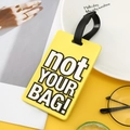 Yellow silicone luggage tag featuring bold black 'not YOUR BAG!' text and strap - Yellow