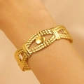 Golden woven rope textured open bangle with oval metal accent on model wrist - Braided Rope Texture Hollow (0383)