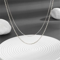 Sleek stainless steel jewelry set with a water wave chain and a bamboo bead necklace - Double Layer Silver Cylinder Bead Chain (C214 Steel)