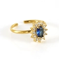 Adjustable stainless steel sun flower ring with blue oval stone and sparkling crystal accents - Gold Inlaid Blue Zirconia