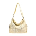 Beige corduroy crossbody bag featuring three plush star patches and side zippers - Off-white