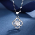 Silver four-leaf clover necklace with sparkling round center stone and diamond halo on blue - Four-leaf Clover Necklace Xl-22