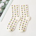 Mid-calf cream cable knit socks featuring delicate small pink and yellow floral patterns - One Size / Off White