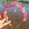 Detailed close-up of pink crystal crown with silver sun pendant and teardrop gem - Red/Sun/AB Colorful Pendant