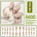 Long almond press-on nails set A600 with translucent pink base and green floral designs - Pink Base White Flower Green Leaf (A600)