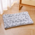 Grey plush pet blanket with dark claw prints on a wooden floor in a cozy home setting - 32*25cm (Within 1.5kg) / Cut-out Paw Grey Mat