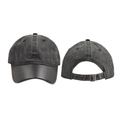 Detail view of washed vintage baseball cap featuring premium leather brim and metal buckle - Black
