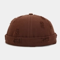 Vintage brown distressed docker hat with ripped details and retro streetwear style - Adjustable / Dark Brown