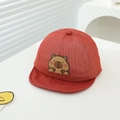Detail of red toddler mesh cap featuring a cute brown cartoon capybara rubber patch - 48-50cm (1-3 Years) / Red