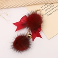Cute red faux mink fur pompom keychain with ribbon bow and golden bell decoration - Red