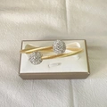 Bracelet torsadé en acier plaqué or 18 carats avec boules pavées de cristaux scintillants - Or/Argent