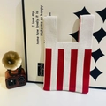 Chic red and white vertical striped knit tote bag for daily commute and stylish use - Striped Redmi
