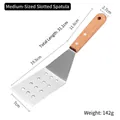 Slotted stainless steel fish spatula with wooden handle and 31.1cm length measurement - Medium Slotted Turner