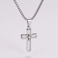 Detailed view of silver double-layered cross pendant with box chain on white background - Small / Steel