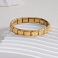 Gold Italian charm bracelet with heart and arrow links on a white wavy display stand - Heart with Arrow Full Gold (BD-115)