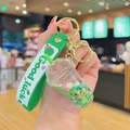 Green astronaut liquid sand bottle keychain with Good Luck silicone wrist strap - Green Quicksand Series-Milk Tea Cup