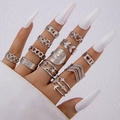 Detail of silver bohemian ring set featuring heart, eye, and leaf designs on fingers - Heart Eye Silver 11pcs Set (22816-silver)