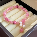 Macro detail of pink crystal bracelet with freshwater pearl pendant in a display box - 4# Pink Crystal Beaded Bracelet