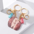 Detail of hedgehog couple keychains with gold clasps, colorful tassels and acrylic pendants - Acrylic Hedgehog Parent-Child Pendant 1 Pair