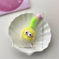 Funny yellow plush hair clip with green spiral antenna and large eyes on shell tray - Yellow / Yellow Plush Hair Clip