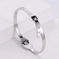Silver polished belt buckle bangle for women featuring micro-set cubic zirconia accents - Steel