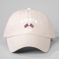 Beige baseball cap with America 1776 embroidery and crossed American flag graphic - Beige