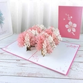 Close-up of 3D pop-up cherry blossom tree greeting card with pink and white petals - Peach & Plum Blossoms (Teacher Appreciation)
