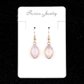 Faceted marquise-shaped white semi-precious stone earrings with gold metal hook frames - Opal