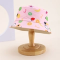 Detail of pink kids bucket hat with vibrant fruit patterns on a wooden display stand - Kids One Size / Pink (Fruit/Sweet Print)
