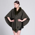 Deep olive green knit poncho with plush faux fur collar and decorative pom-pom detail - Army Green