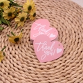 Pink heart-shaped paper thank you tags on a decorative woven mat background - Heart Tag No. 8