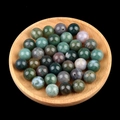Mix of 12mm half-hole agate round beads in various colors displayed in a wooden bowl - 12mm Indian Agate Semi Drilled Bead