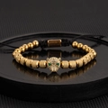 Golden leopard head beaded bracelet with green eyes and black adjustable braided cord - Gold Leopard Pineapple Bead Bracelet