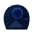 Detailed view of dark blue velvet baby turban hat with soft plush pompom decoration - One Size / Navy Blue