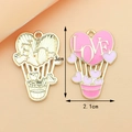 Pink heart balloon pendant with LOVE text in gold finish showing 3cm by 2.1cm dimensions - Pink Hot Air Balloon