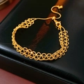 Macro shot of gold-plated lace bead bracelet on premium black leather display texture - Gold (Real Gold Plated)