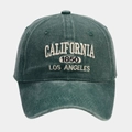 Close-up of vintage embroidered California 1850 text on dark green washed cotton cap - Adjustable / Embroidery/Distressed / Green