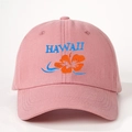 Close-up of the detailed Hawaii embroidery and hibiscus flower on the pink cotton baseball cap - One Size / Deep Pink