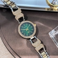 Vue détaillée de la montre quartz pour femme avec cadran vert et cristaux brillants - Boîtier Bicolore Cadran Vert