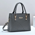 Minimalist dark grey faux leather handbag with diamond quilted pattern and gold metal hardware - Gray