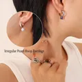 Irregular pearl style drop earrings in silver finish with matching elegant rings - Steel Purple Zirconia Pearl Earrings
