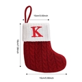 Red knit Christmas stocking with embroidered letter K and product size dimensions - Letter K