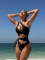 Detail of sexy black one-shoulder swimsuit featuring waist cutouts and drawstring ties - S / Black