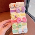 Set of six pastel bow hair ties for girls in soft macaron colors on card holder - Bowknot Style