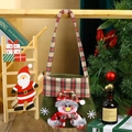 Detail of green felt Christmas gift bag featuring a 3D snowman with plaid hat and scarf - New Handbag Snowman