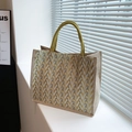 Striped jute tote bag featuring yellow and grey chevron pattern and rope handles - Yellow